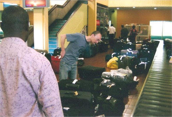 Kenya Airport. Bag missing. Erik searching.