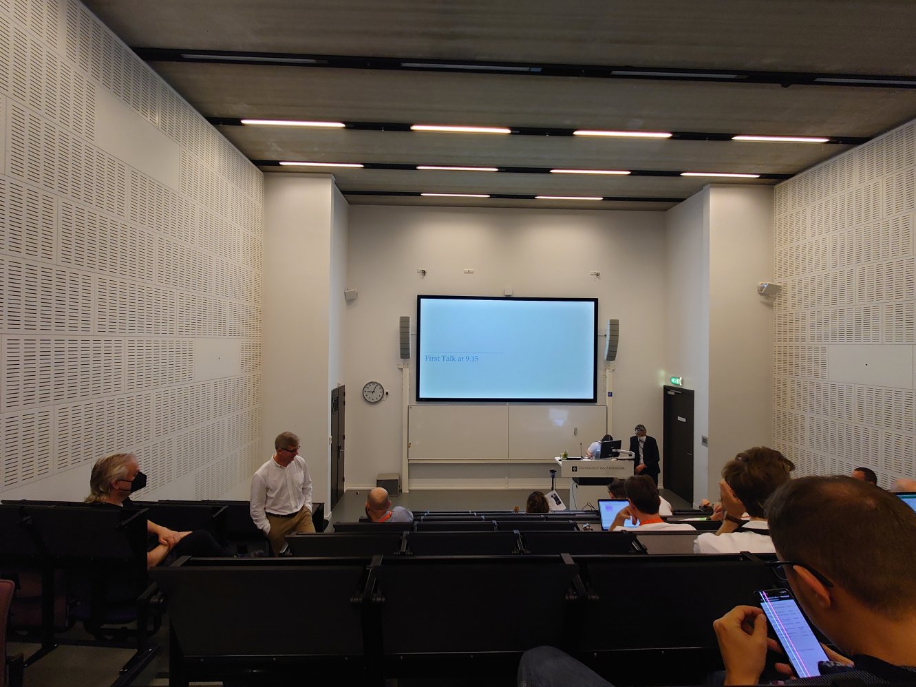 David Chalmers (left) and the rest of us getting reading for the first session of the day, Amsterdam 2022.